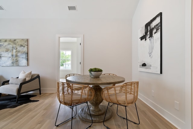 dining area with light wood-type flooring