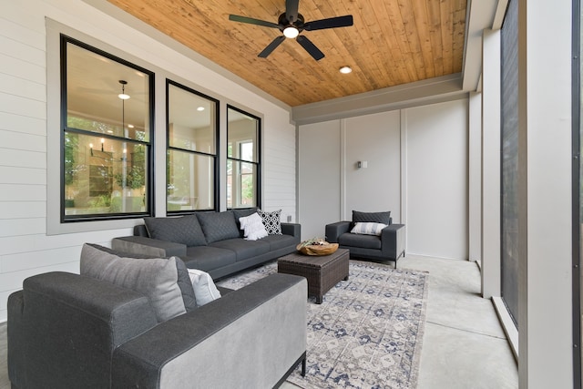 sunroom / solarium featuring wood ceiling and ceiling fan with notable chandelier