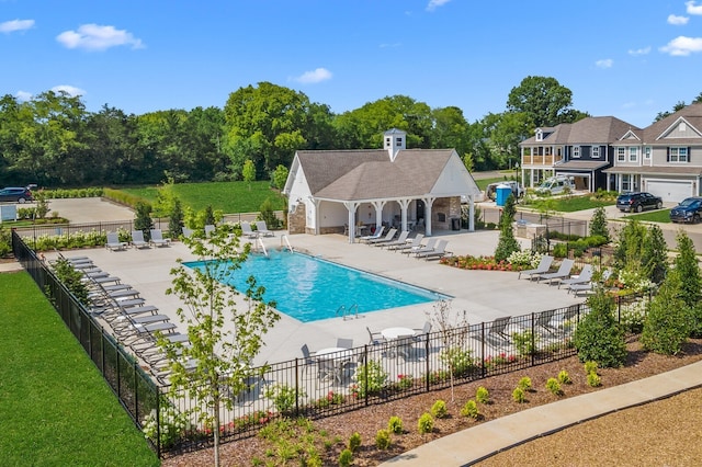 view of swimming pool with a patio