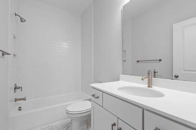 full bathroom with tile flooring, toilet, tiled shower / bath combo, and oversized vanity