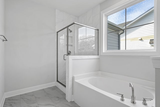 bathroom with independent shower and bath and tile flooring