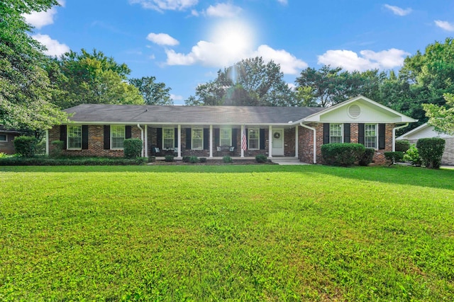 ranch-style house with a front lawn