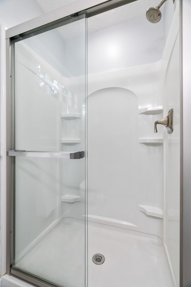 bathroom with an enclosed shower