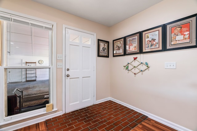 entrance foyer featuring dark hardwood / wood-style flooring