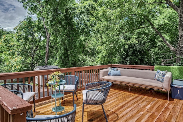 deck featuring outdoor lounge area