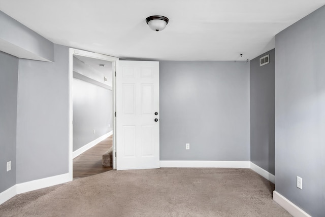 view of carpeted spare room