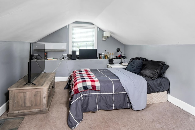 bedroom with carpet floors and lofted ceiling