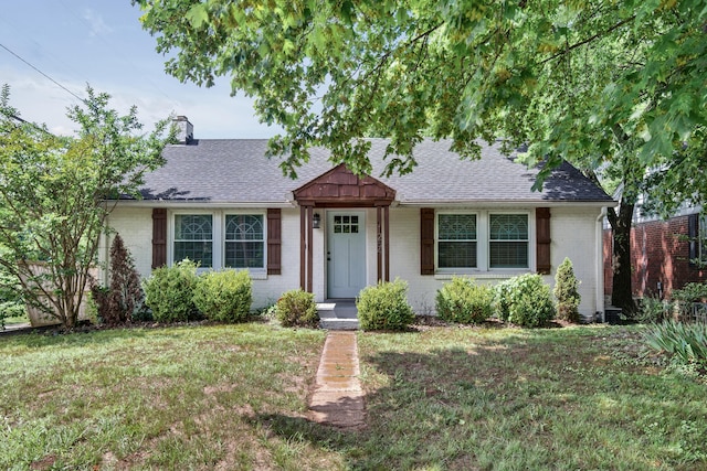 ranch-style house with a front yard