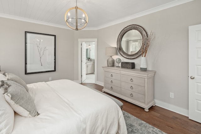 bedroom featuring a chandelier, connected bathroom, ornamental molding, and dark wood-type flooring