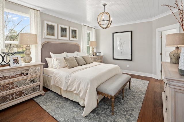 bedroom featuring an inviting chandelier, multiple windows, dark hardwood / wood-style floors, and crown molding