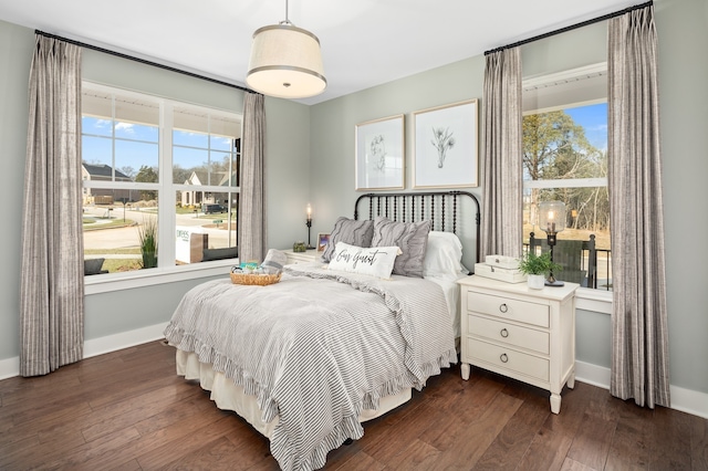 bedroom featuring dark wood-type flooring