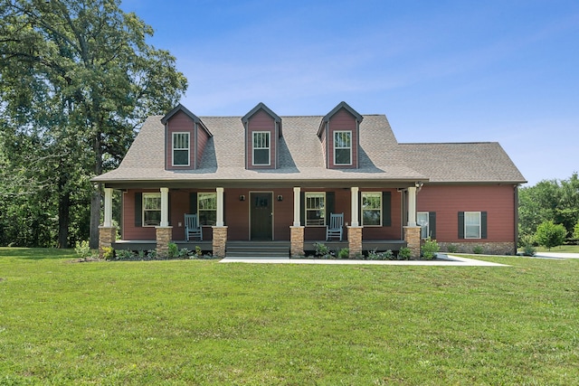 cape cod home with covered porch and a front yard