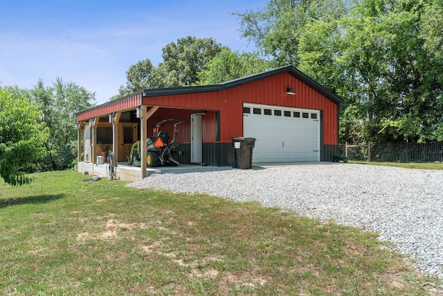 garage with a yard