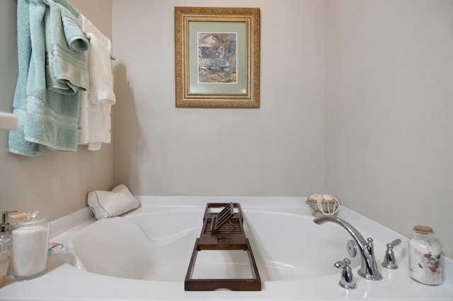 bathroom featuring a bath to relax in