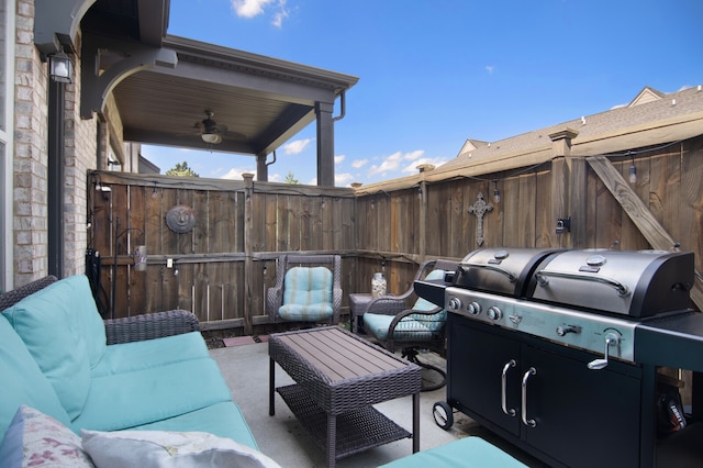 view of patio featuring ceiling fan, an outdoor hangout area, and area for grilling