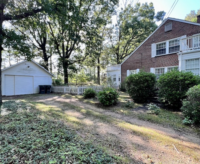 view of yard featuring a garage