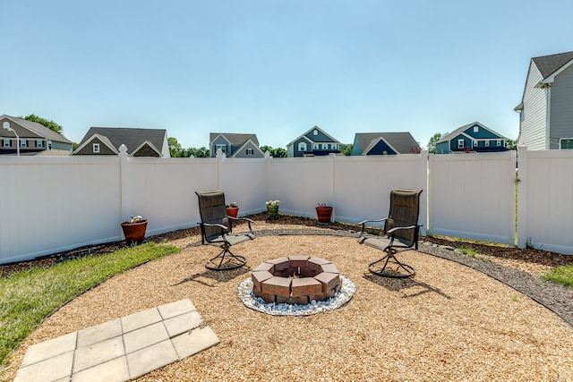 view of yard featuring a fire pit