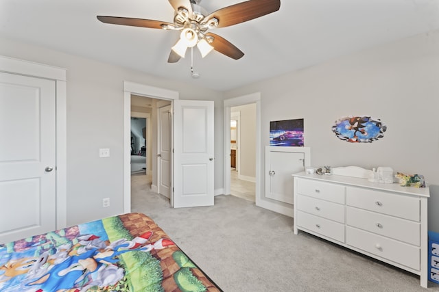 carpeted bedroom with ceiling fan