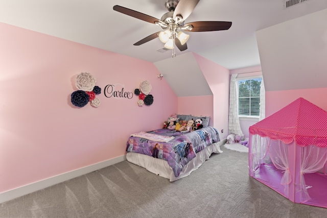 bedroom with ceiling fan, carpet, and vaulted ceiling