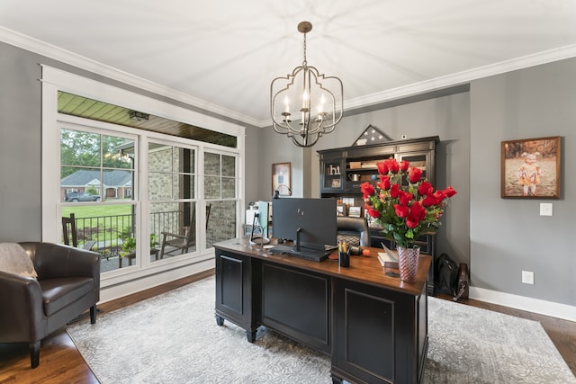 office space featuring a chandelier, ornamental molding, and hardwood / wood-style floors