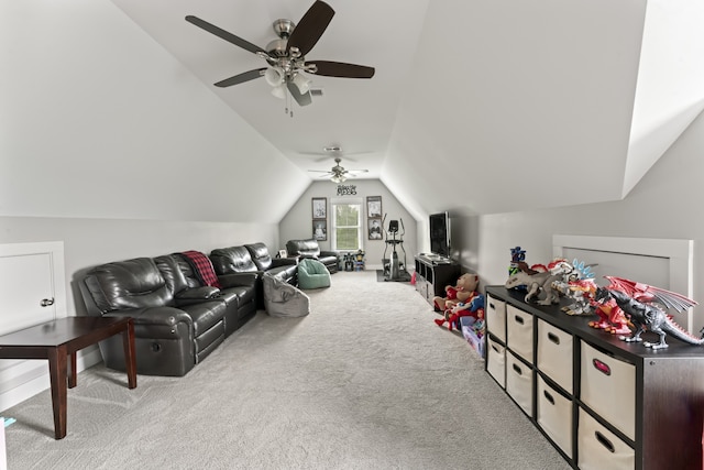 playroom with light carpet, lofted ceiling, and ceiling fan