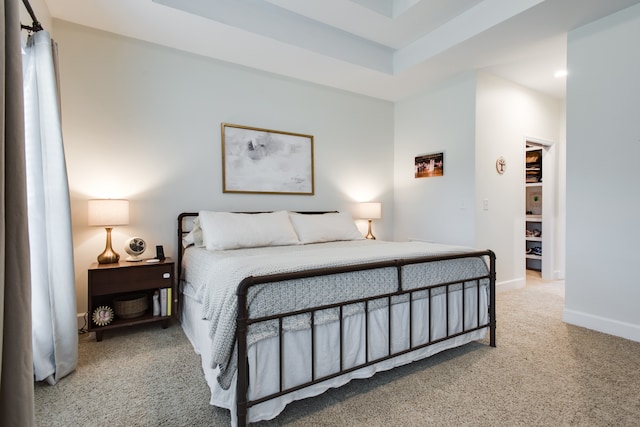 bedroom with light colored carpet