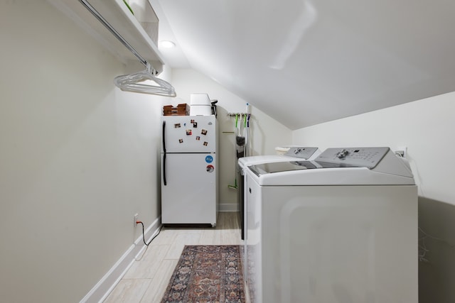 laundry area featuring washing machine and dryer