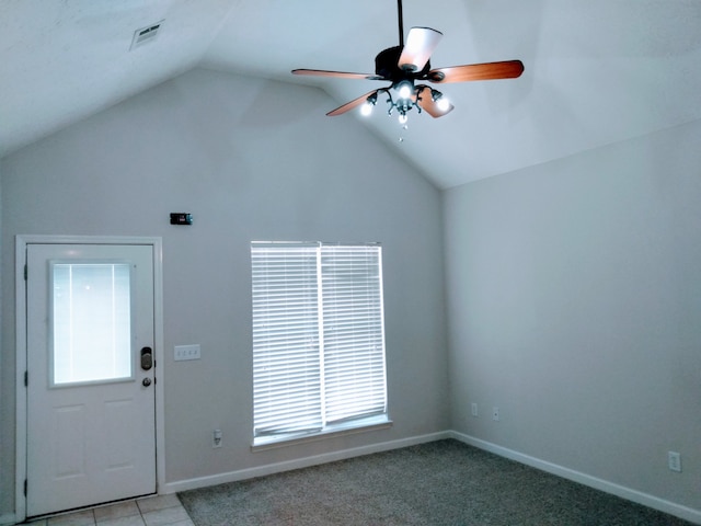 unfurnished room with light carpet, ceiling fan, and lofted ceiling