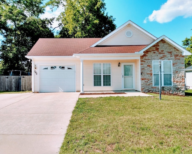 ranch-style house with a front yard and a garage