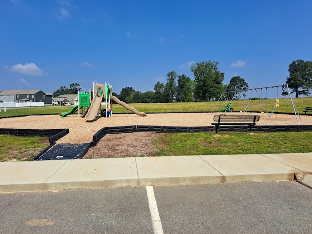 view of play area featuring a yard