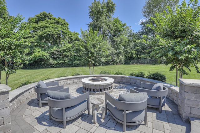 view of terrace featuring a fire pit