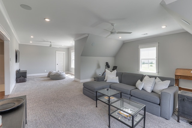 living room with ceiling fan, ornamental molding, light colored carpet, and vaulted ceiling