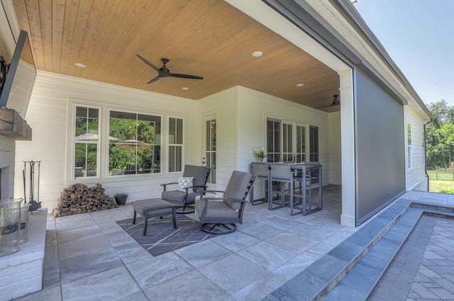 view of terrace featuring ceiling fan