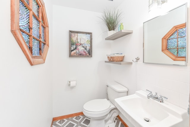 bathroom with sink and toilet