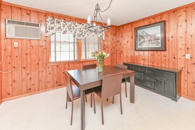 tiled dining area featuring an inviting chandelier, an AC wall unit, and wood walls