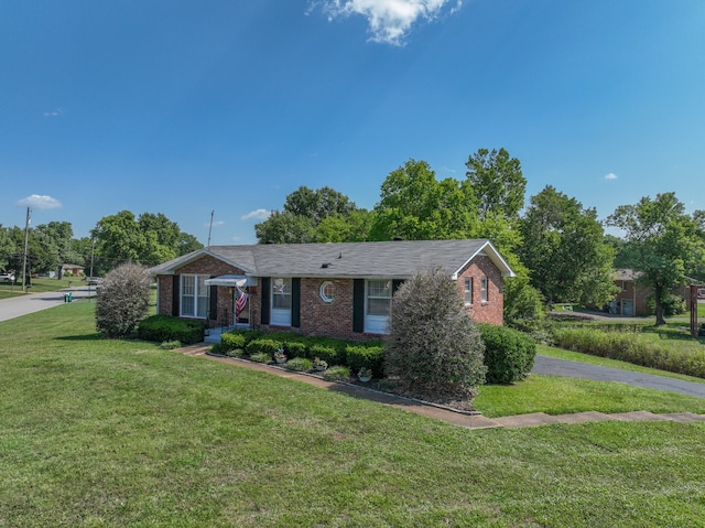 view of front of home with a front yard