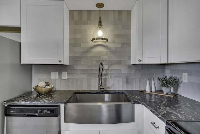 kitchen with white cabinets, hanging light fixtures, tasteful backsplash, and dishwasher