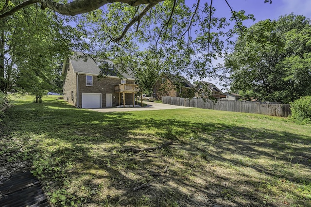 view of yard featuring a garage