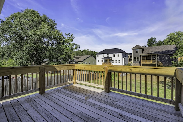 deck featuring a lawn