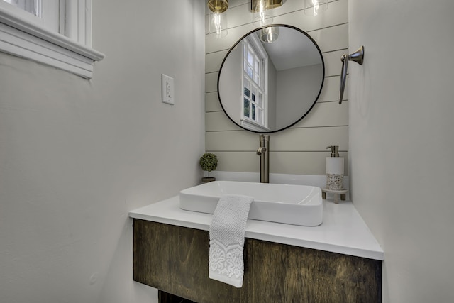 bathroom featuring vanity with extensive cabinet space