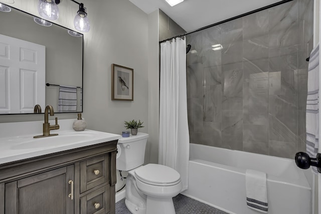 full bathroom featuring tile floors, oversized vanity, shower / tub combo with curtain, and toilet