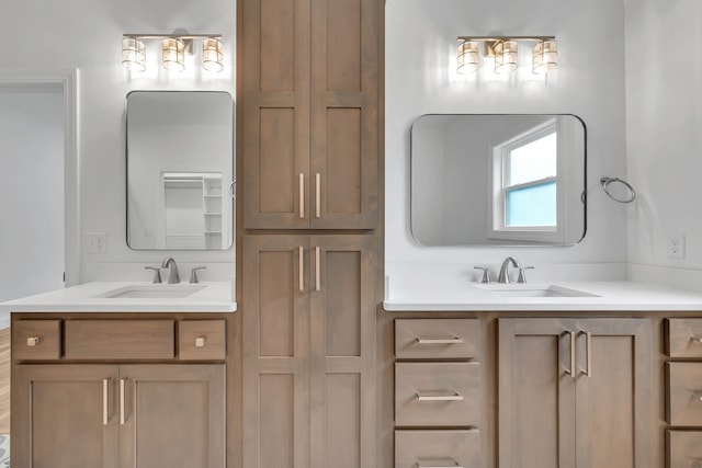 bathroom featuring dual vanity