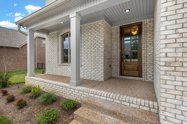 property entrance with a porch