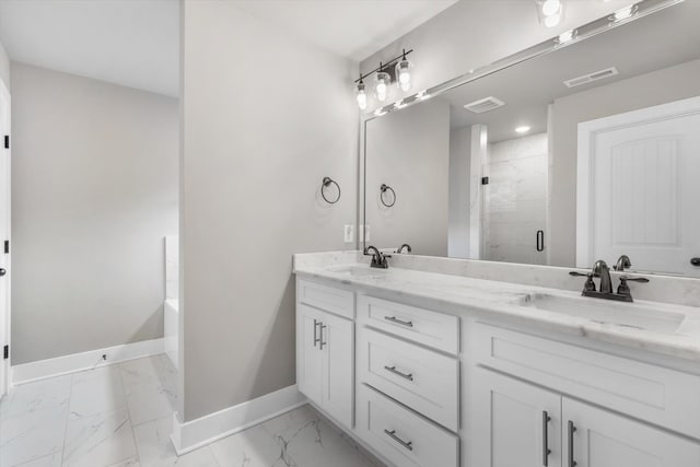 bathroom featuring double sink vanity and tile floors