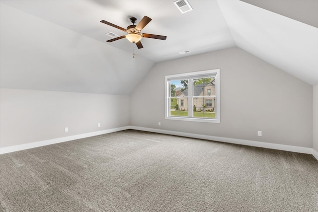 bonus room with carpet floors, ceiling fan, and lofted ceiling