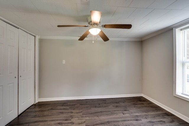 unfurnished bedroom featuring ceiling fan, ornamental molding, multiple windows, and dark hardwood / wood-style floors