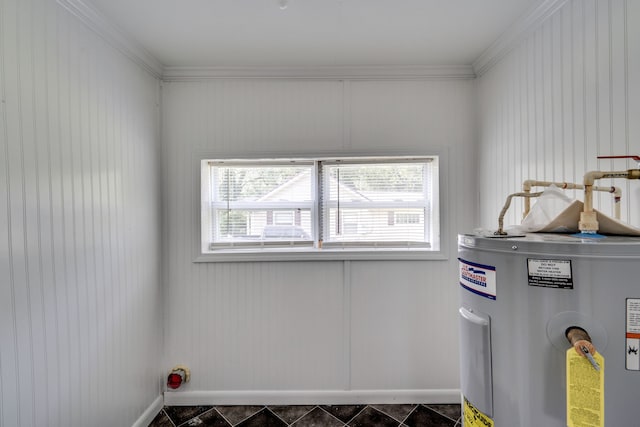 utility room featuring water heater