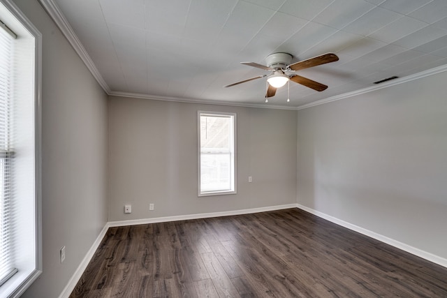 spare room with ornamental molding, dark hardwood / wood-style flooring, and ceiling fan