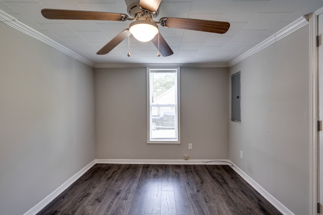 spare room featuring ornamental molding, ceiling fan, and dark hardwood / wood-style floors