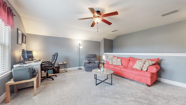 carpeted office featuring ceiling fan